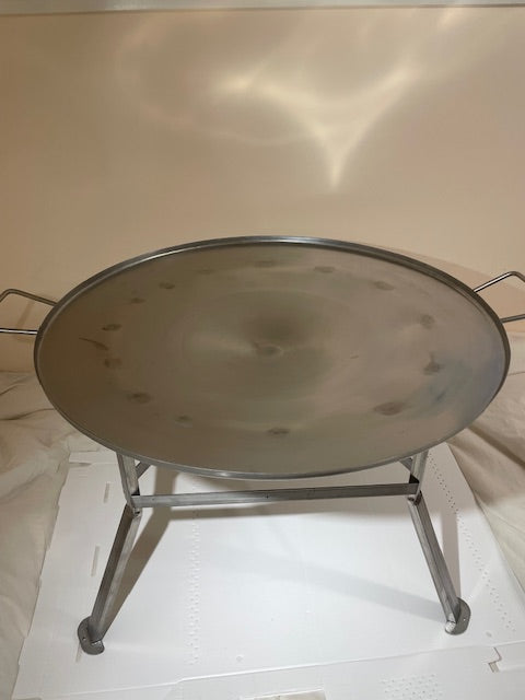 stainless steel round korean grill that can be used with open fire, charcoal, or propane. Comes with lid and charcoal tray. Legs and handles. Perfect for cabins, campsites, or any outdoor location. There is a fire ban, no problem, can be easily used with propane fire.