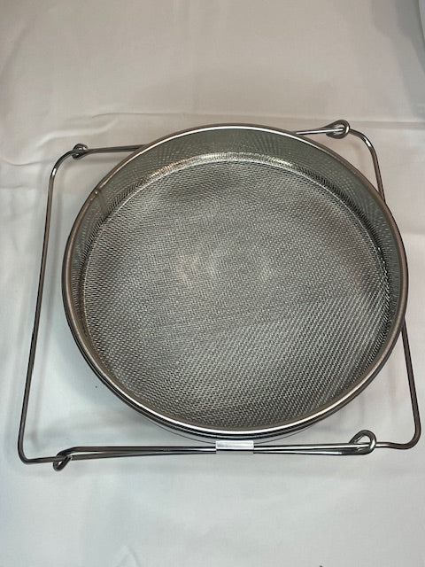 double sieve filters out debris from honey