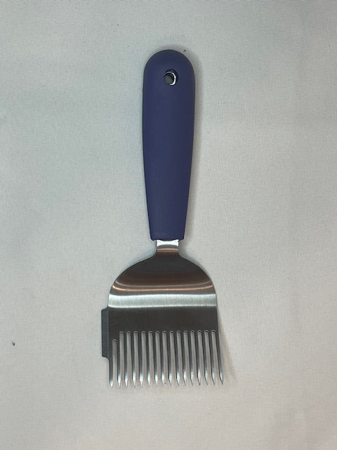 stainless steal uncapping fork with comfortable rubber handle. used to remove wax uncapping.