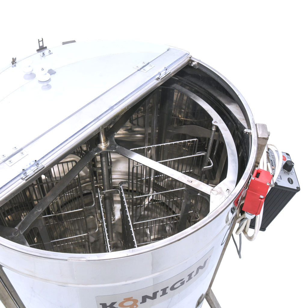premium tangential extractor.  Digital programmable control.  all stainless steel construction.  frames are laced in individual cassettes and machine is programmed to automatically rotate the frames between sides.