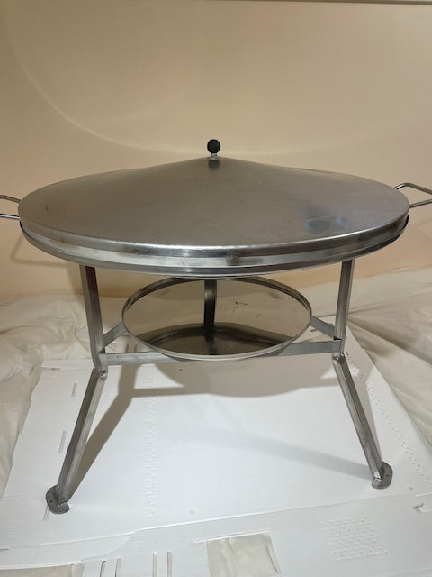 stainless steel round korean grill that can be used with open fire, charcoal, or propane.  Comes with lid and charcoal tray. Legs and handles.  Perfect for cabins, campsites, or any outdoor location.  There is a fire ban, no problem, can be easily used with propane fire.