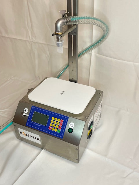 stainless steal honey bottling machine with heavy duty motor. automatic or manual. 7L/min flow rate