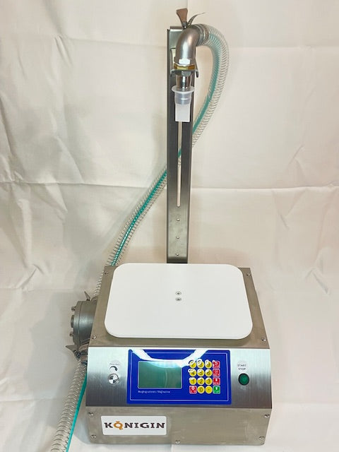 stainless steal honey bottling machine with heavy duty motor. manual or automatic. 